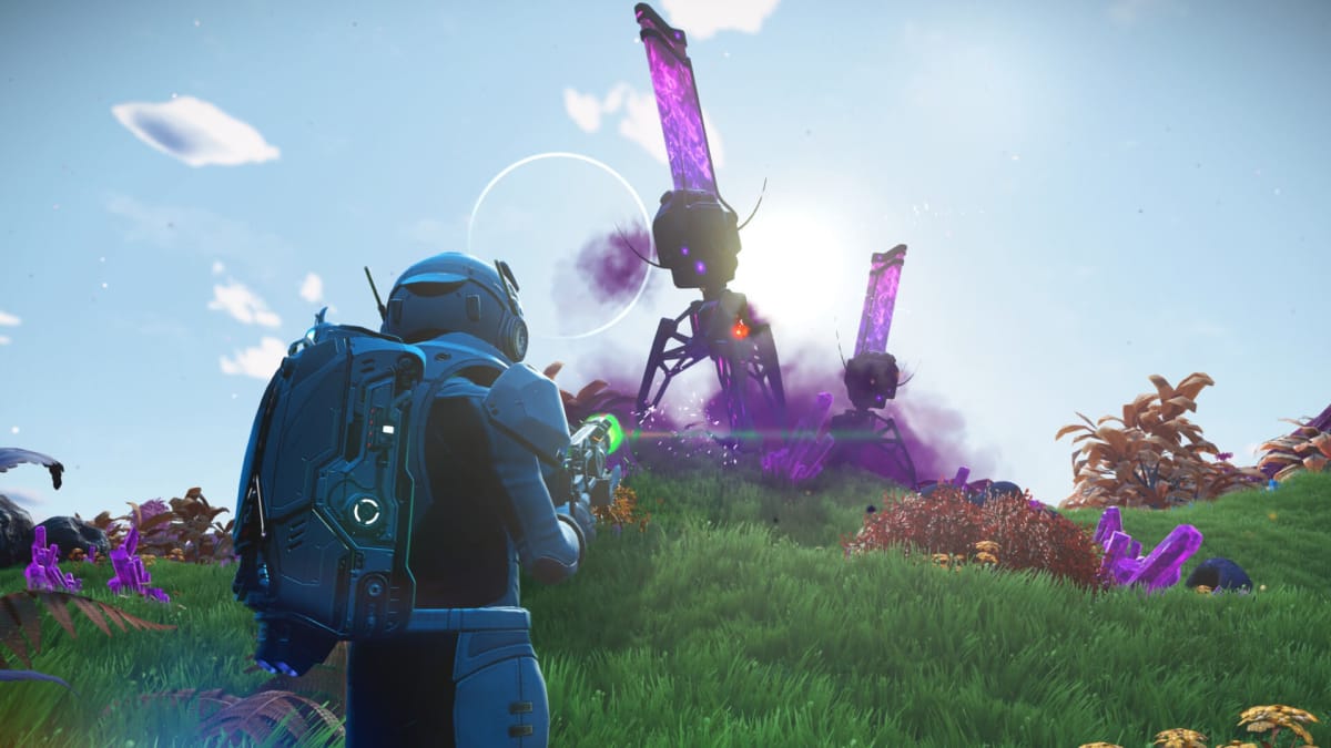 The player using a beam on some structures in No Man's Sky