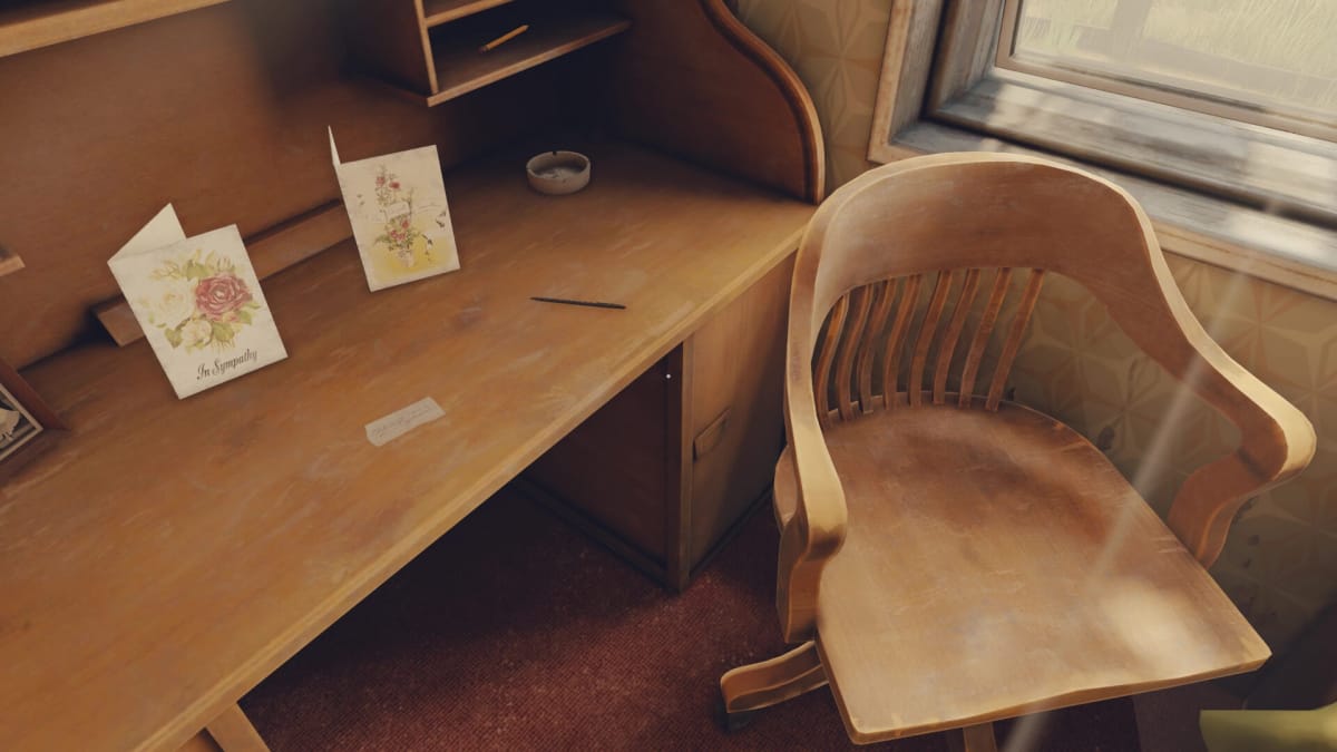 A beautiful writing desk with cards and a note on it in Open Roads
