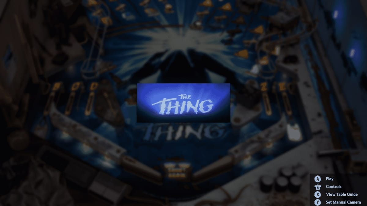 An in-game screenshot of Pinball M, showcasing the intro of John Carpenter's The Thing inside a small screen in front of the table.