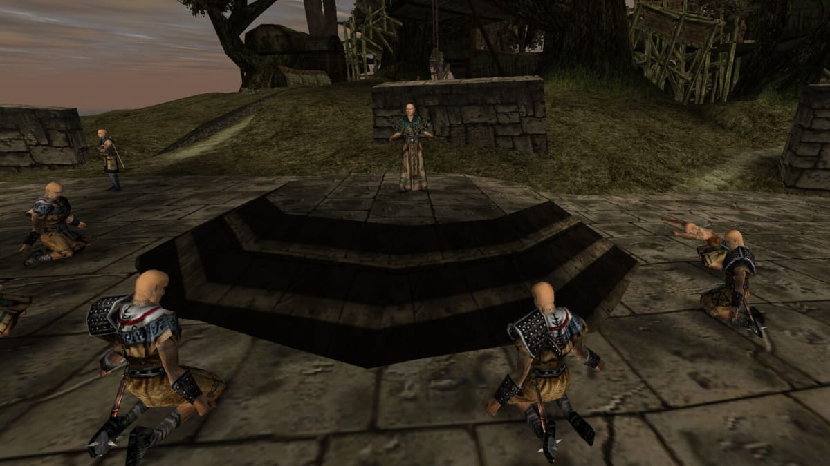 A group of characters gathered around an altar on which a priest-like figure stands in the Piranha Bytes game Gothic