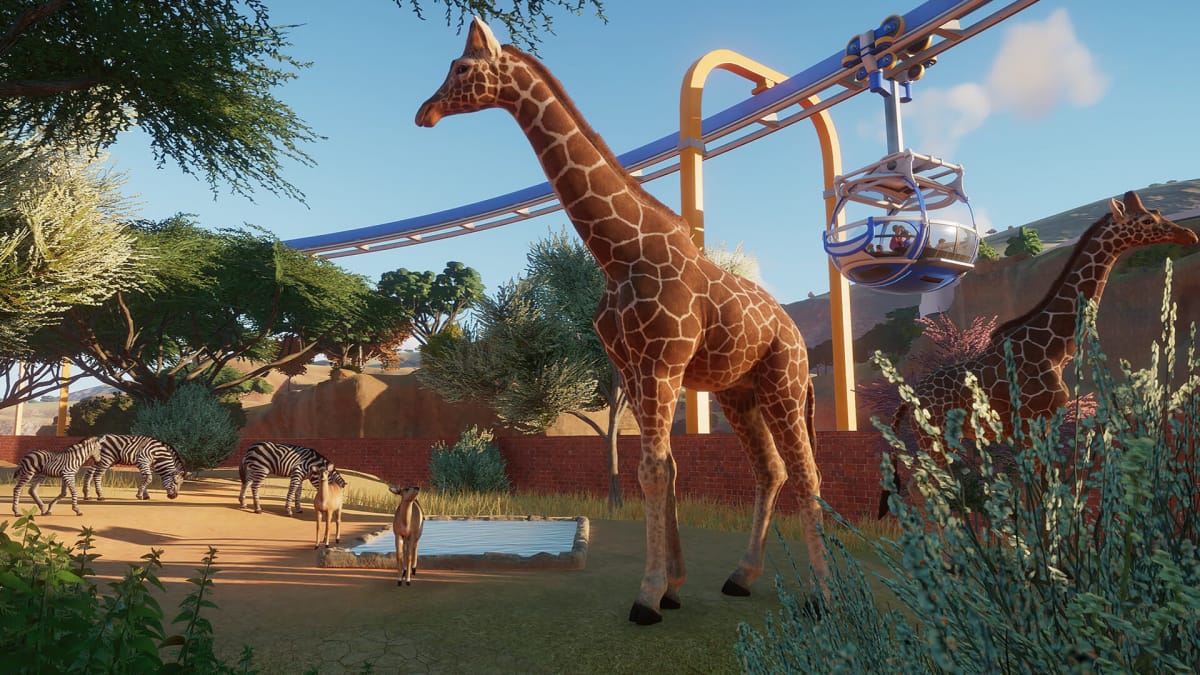 A Planet Zoo enclosure in which several animals, including a giraffe and some zebra, can be seen