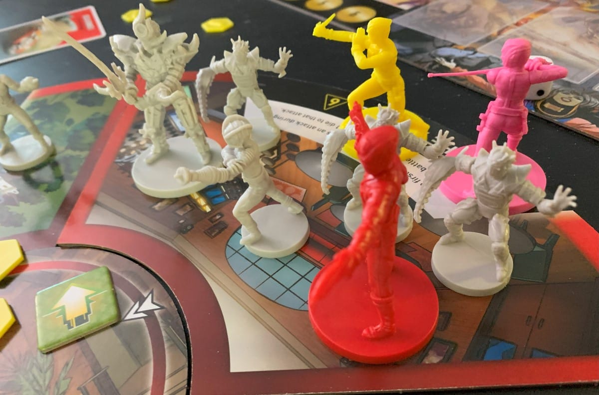 A screenshot of tyrannodrones, a blue head, Snide, and the Red, Pink, and Yellow Ranger in a game of Heroes of the Grid