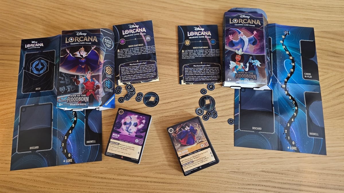 The contents of the 2 Disney Lorcana Rise of the Floodborn Starter Sets.
