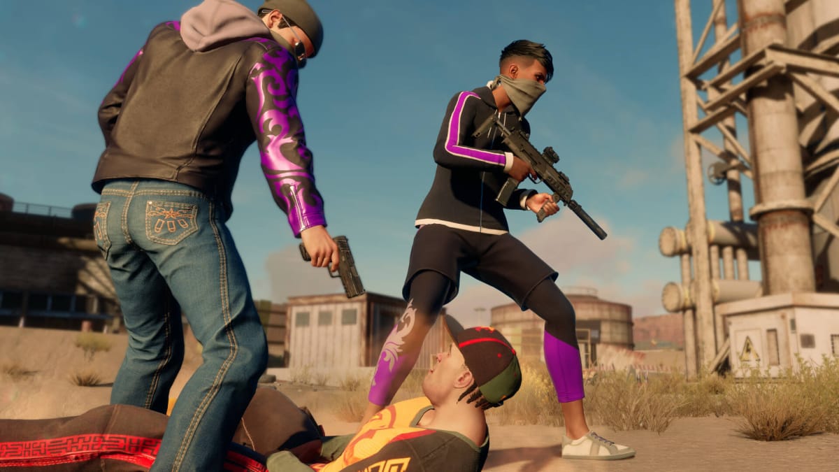 A member of the Saints aiming a gun at a downed foe while another keeps lookout in Saints Row, an Embracer Group game
