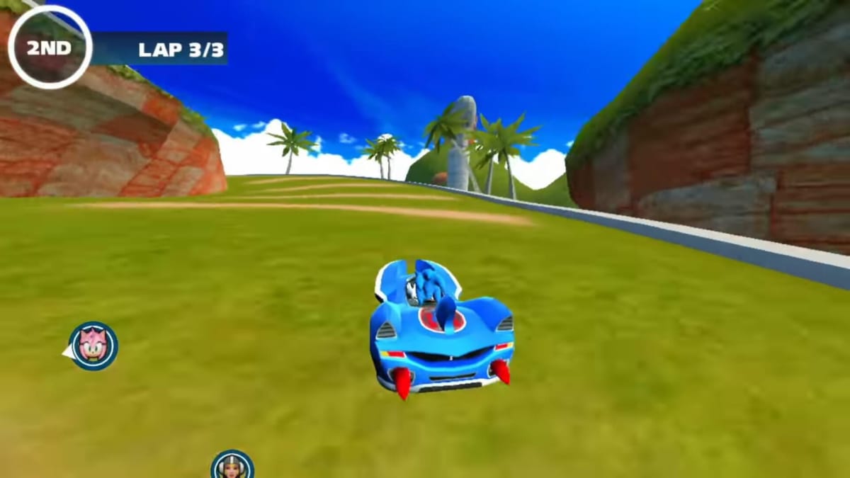 Sonic racing around a track in the mobile version of Sonic & All-Stars Racing Transformed, intended to represent the PlayStation Plus PS Vita version