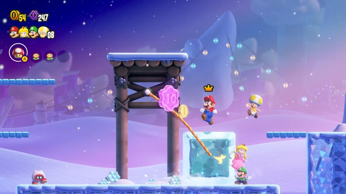 Mario and friends jumping around an icy stage in Super Mario Bros. Wonder, which is number two in the UK boxed sales charts