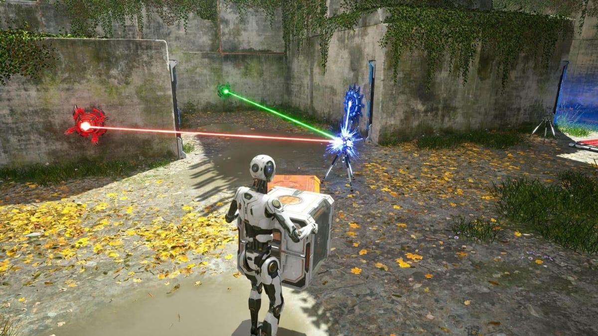 The player carries a square block. Red and green lasers are shown hitting a blue device.