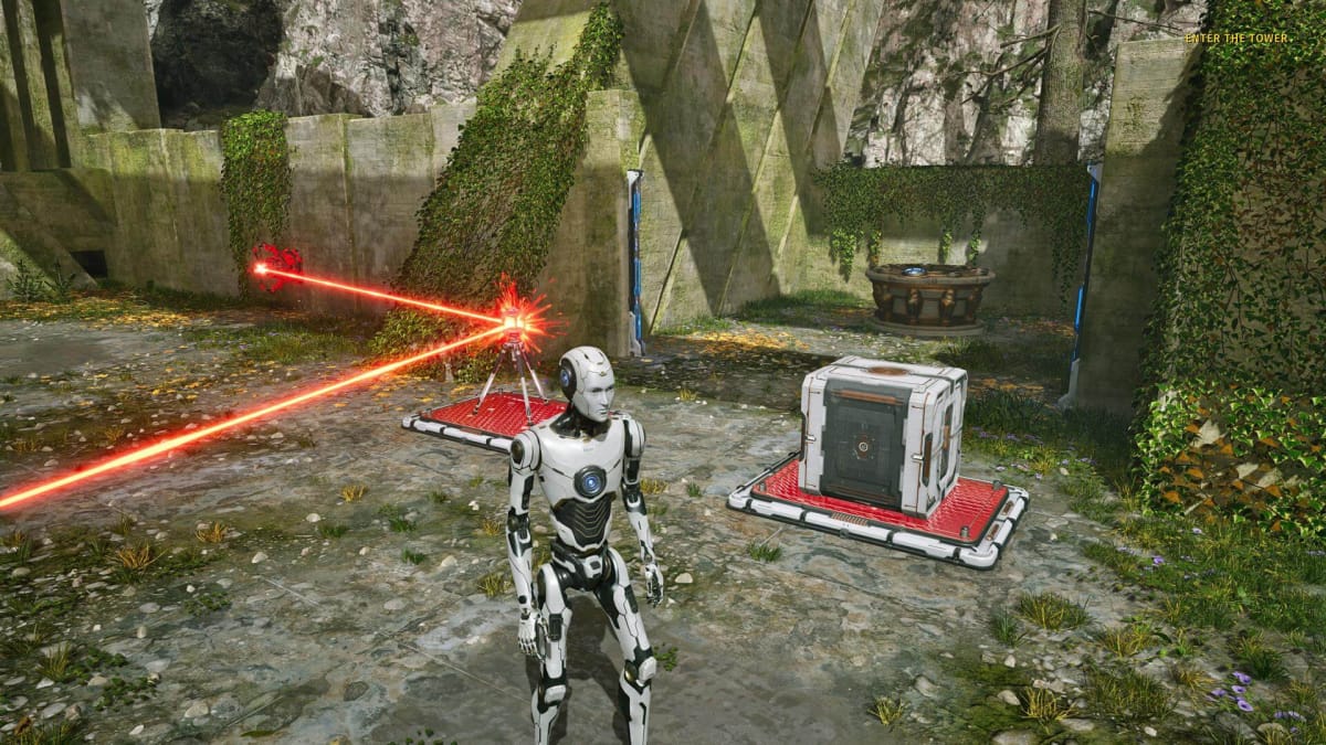 The player stands next to a couple of devices. A hole bored through a wall is seen nearby in The Talos Principle 2 Keeping Connections and Loop Puzzle.