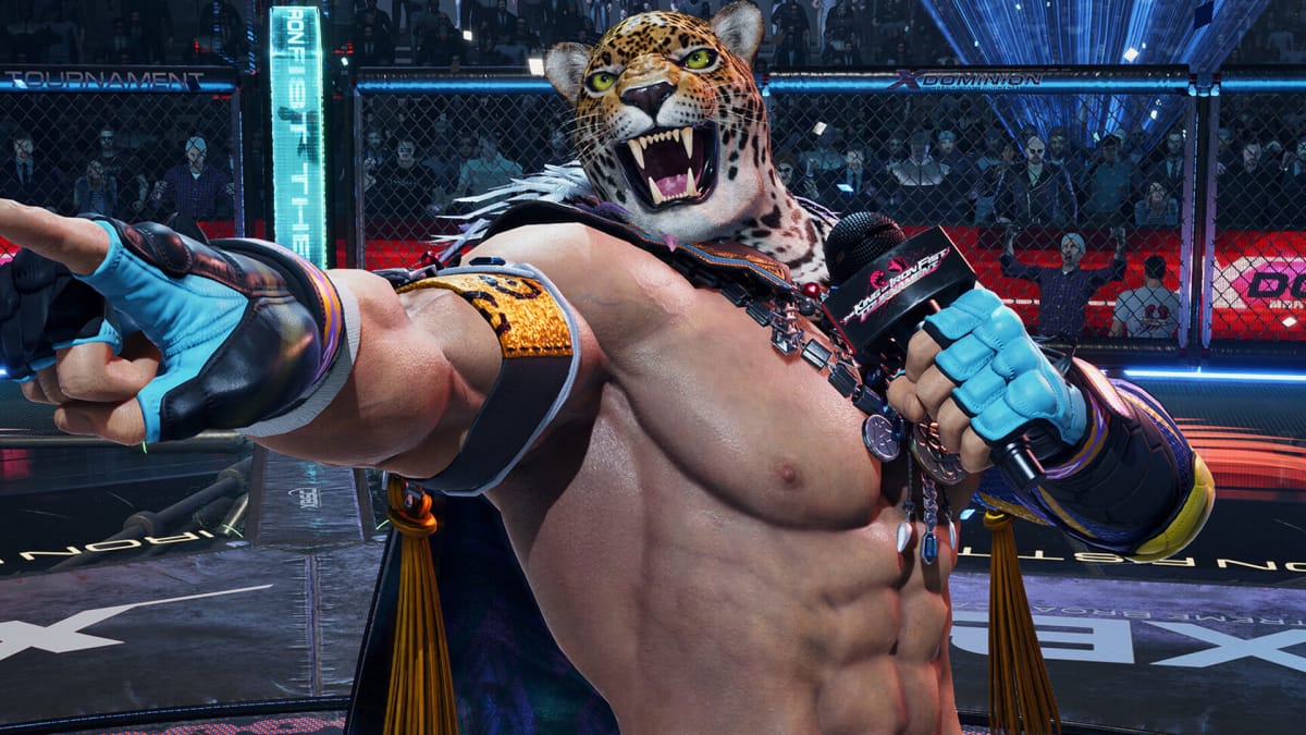 King standing in the middle of a wrestling ring and holding a microphone in Tekken 8