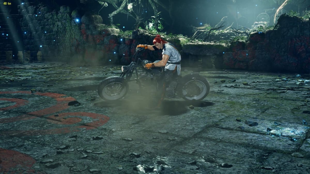 Hwoarang does an Akira slide on his motorcycle at the start of a battle in Tekken 8.