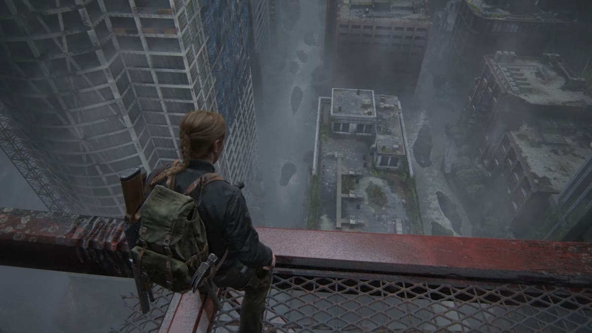 Abby looking out over a post-apocalyptic city in The Last of Us Part II