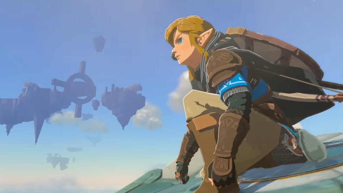 A screenshot of Link on a glider flying through the sky from The Legend of Zelda Tears of the Kingdom