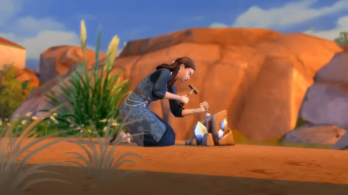 A Sim kneeling down and gathering materials from a geode for the Gemology profession in the new The Sims 4 Crystal Creations Stuff Pack