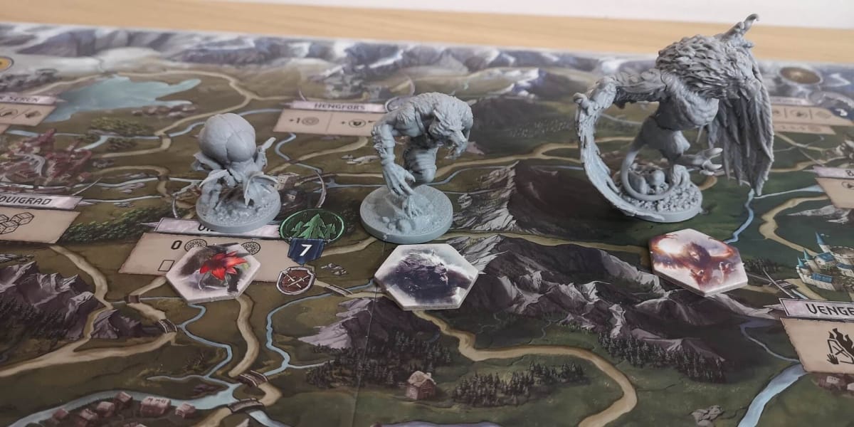 An image from our The Witcher Old World Review depicting The Witcher: Old World monster miniatures and tokens.