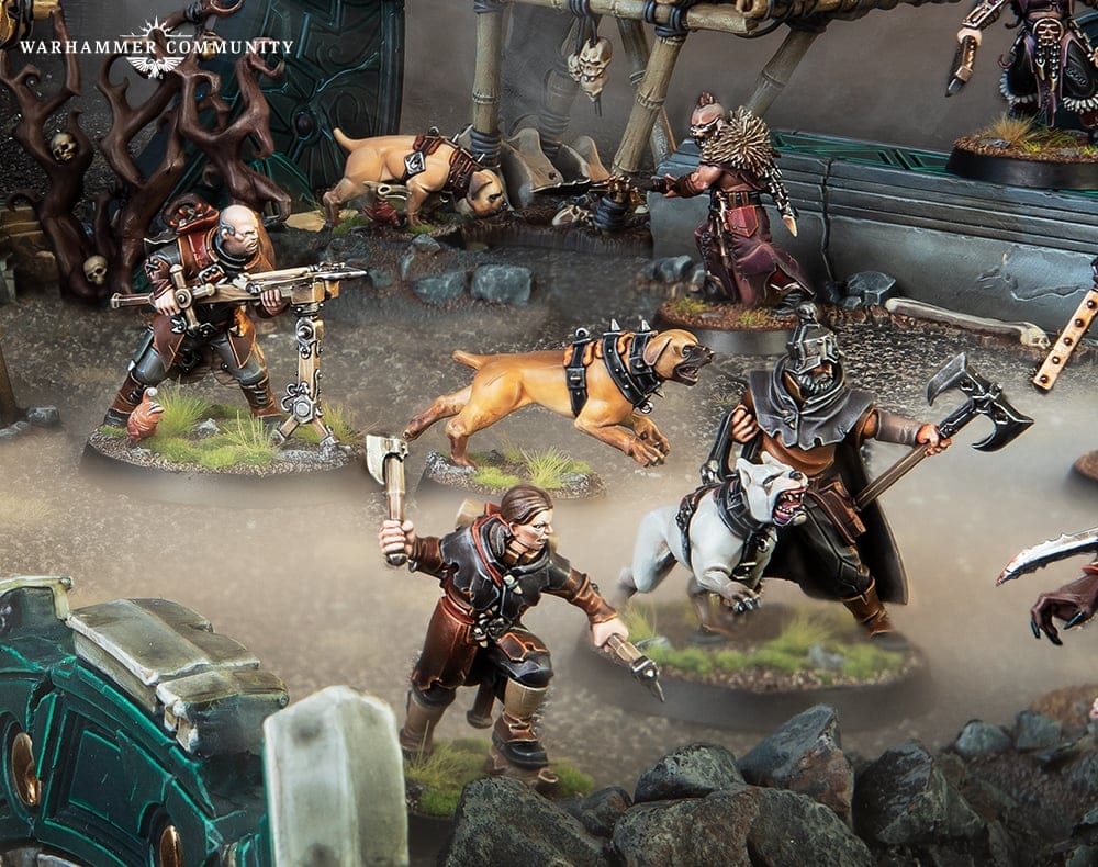 An image of Wildercorps Hunters and their dogs going at it in our Warcry Hunter and Hunted Preview
