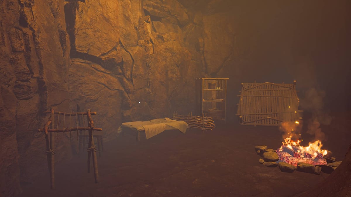 A potential Endless Mode scenario inside a cave with a lit fire and loom already built.