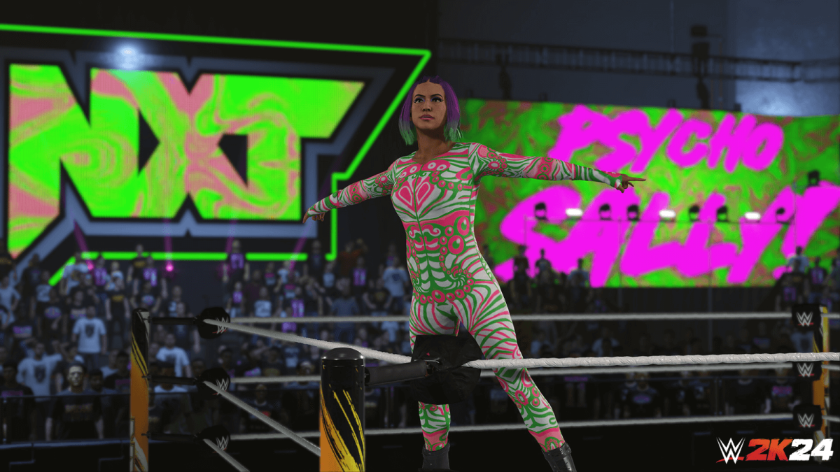 An in-engine screenshot of WWE 2k24, showcasing a female wrestler taunting the crowd from on top of a turnbuckle.