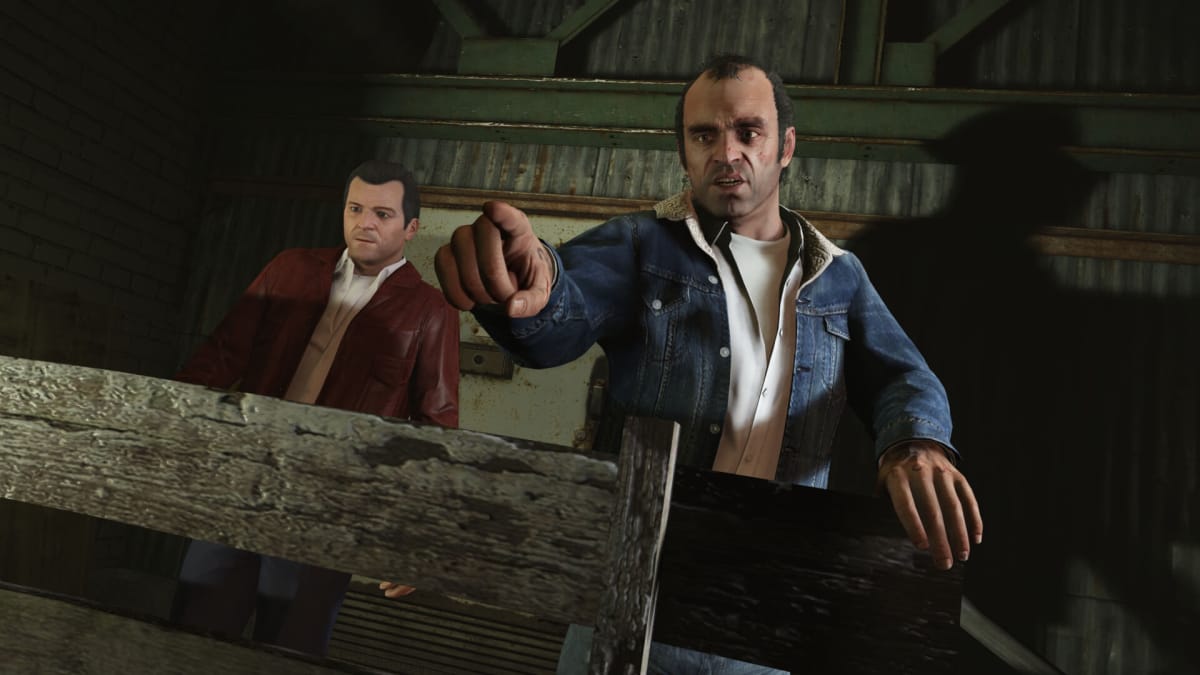 Trevor pointing while Michael looks on in GTA 5, one of the games being added in Xbox Game Pass July 2023 Wave 1