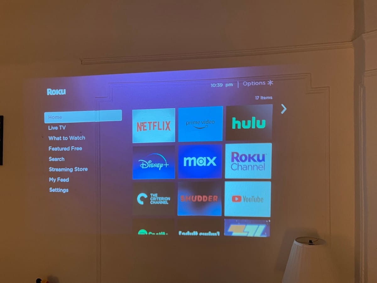 YABER Pro Y9 4k Projector Review shown in a bed room