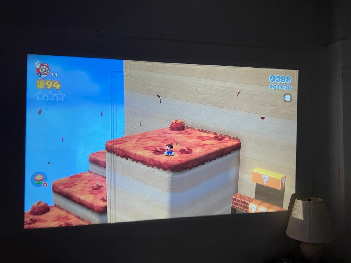 YABER Pro Y9 4k Projector Review image showing the projector while playing Super Mario 3D World