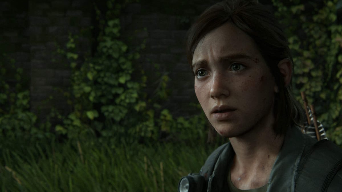 Ellie looks on with an inscrutable expression in The Last of Us Part II