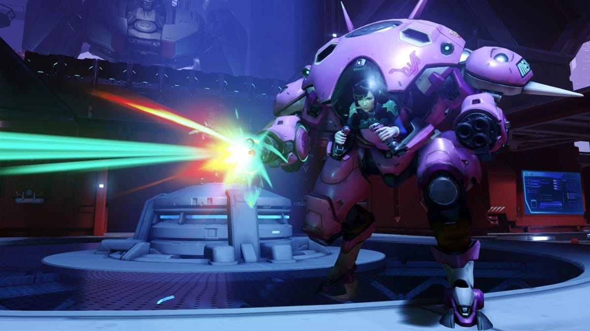 Overwatch screenshot showing a mech suit shooting a laser in a sci-fi setting, with a young woman piloting the mech suit in a face-forward position. 