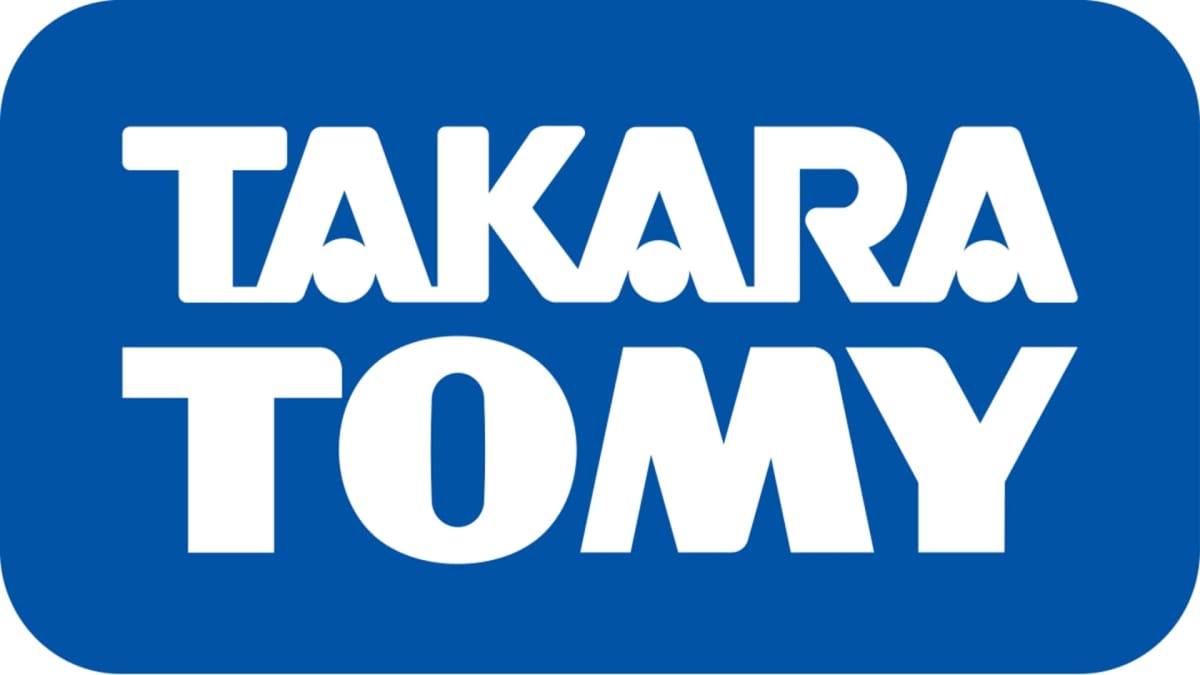 The logo for TOMY, a Japanese company that specializes in children's entertainment.