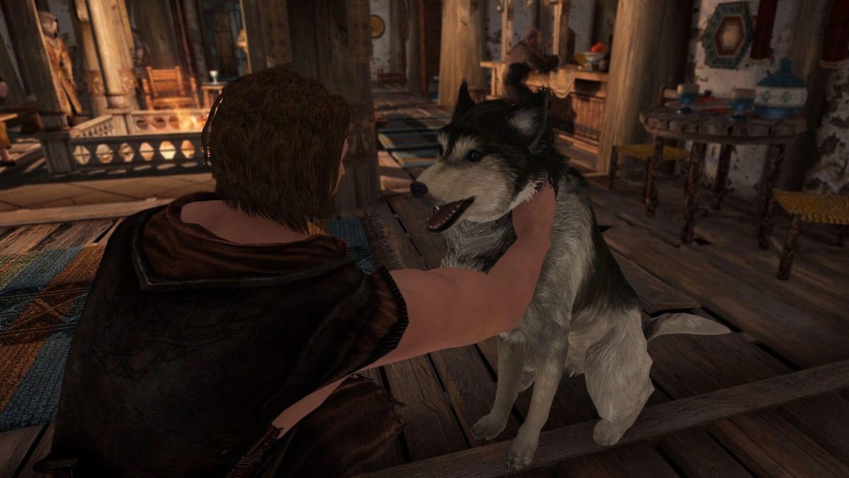 A dog being pet in Skyrim thanks to the power of mods.