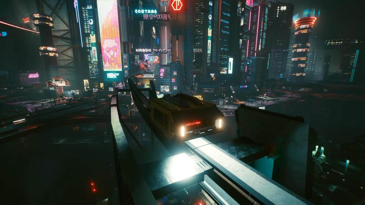 A nighttime view of the city from the metro in Cyberpunk 2077.