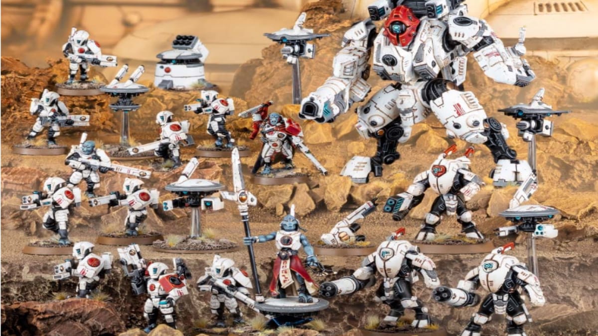 A collection of Tau mech and battlesuit miniatures from Warhammer 40k.