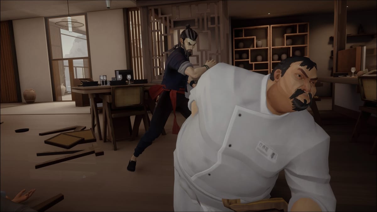 The hero of Sifu taking down a giant chef