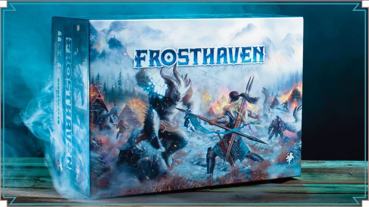 The box art of Frosthaven on a table