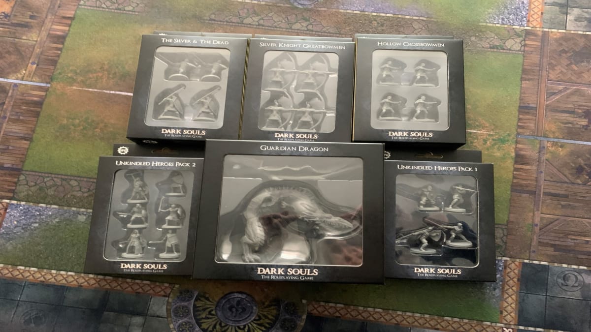 A handful of boxes from Dark Souls: The Roleplaying Game miniatures line