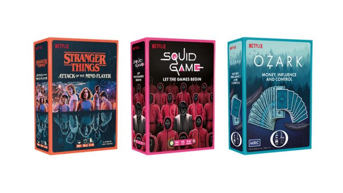 Three different board game boxes showing artwork from Stranger Things, Squid Game, and Ozark