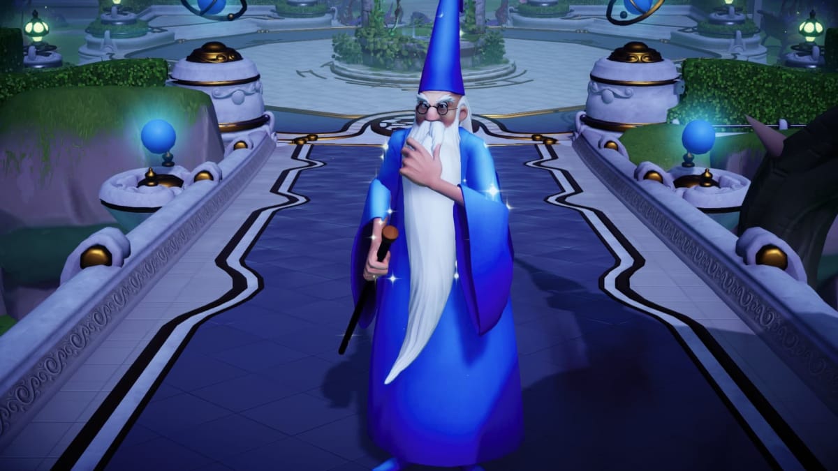 Screenshot of Merlin in Disney Dreamlight Valley, standing in the Plaza stroking his long fluffy white beard, Disney Dreamlight Valley Merlin Guide