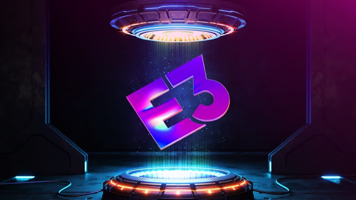 An E3 logo in purple falling between two teleporters