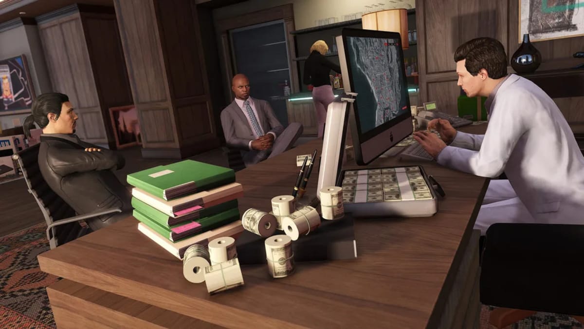 GTA Online characters sitting around a desk, probably not discussing the Grand Theft Auto 6 leaks but hey who knows