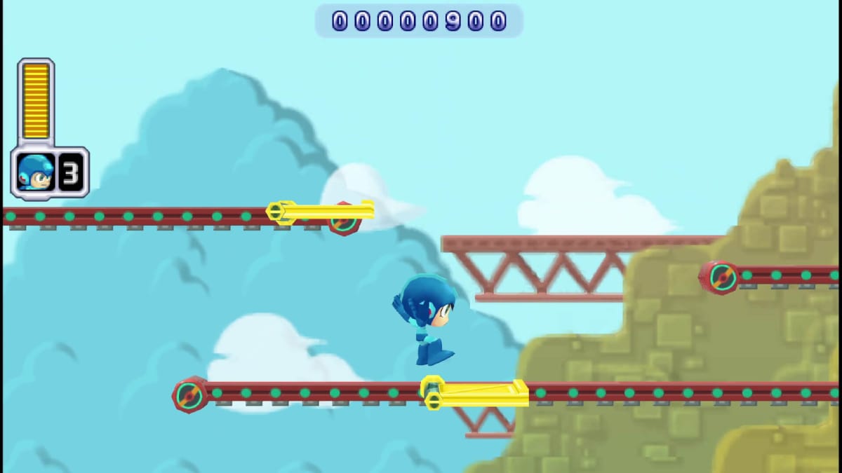 Mega Man leaping across platforms in the PSP game Mega Man Powered Up