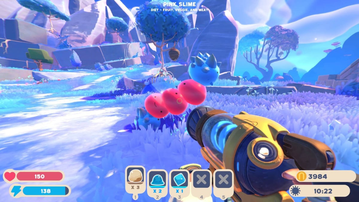 The player aiming at three red slimes and a blue spiky one in a colorful landscape in Slime Rancher 2