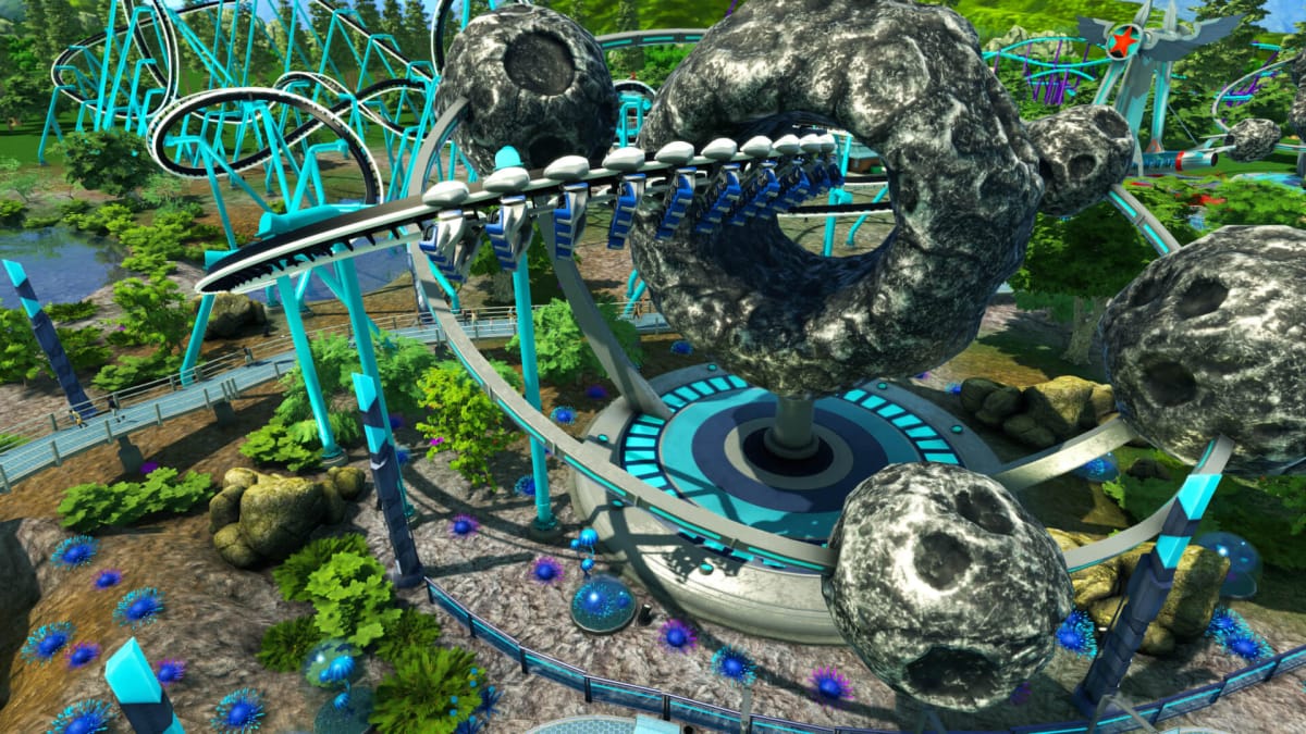 A twisting rollercoaster with a space theme in Atari's Rollercoaster Tycoon World
