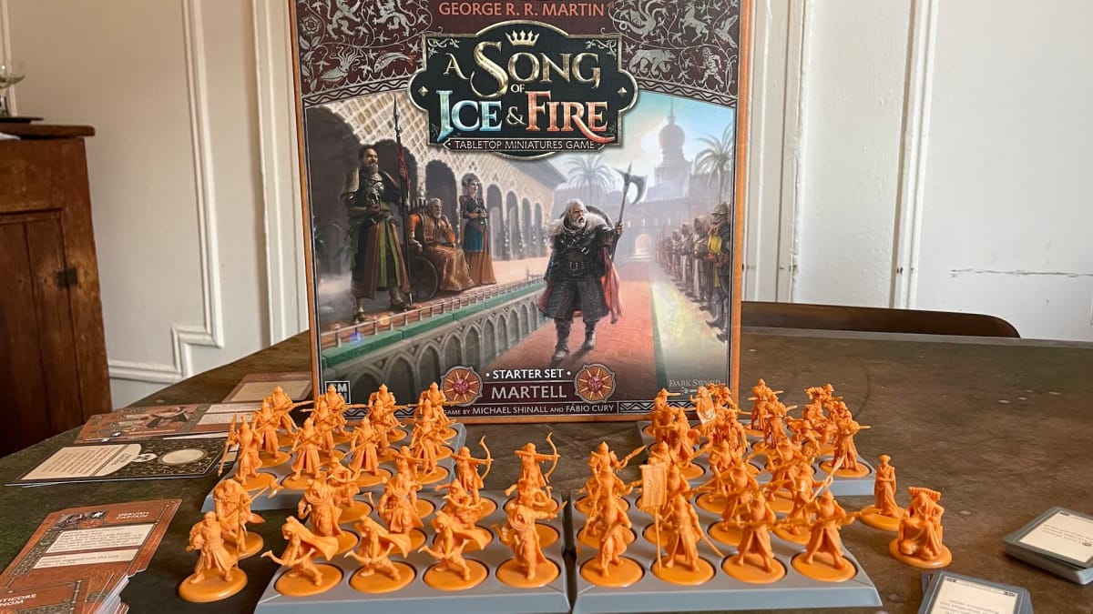 An image of all the plastic miniatures from A Song Of Ice And Fire TMG - House Martell Starter Set, cast in bright orange
