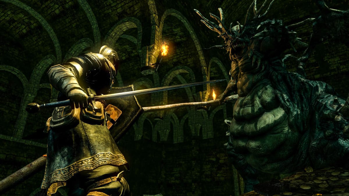 The player facing off against a demon in Dark Souls Remastered