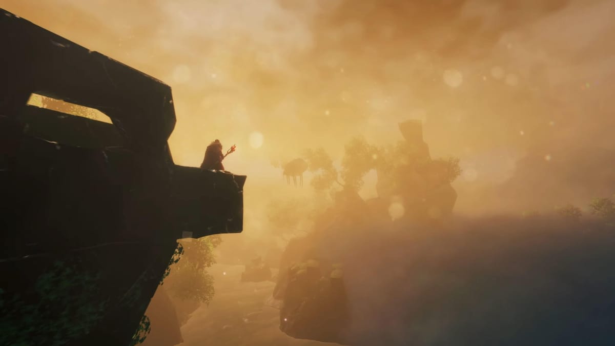 A Viking sorcerer standing on a ruin and looking out over a misty landscape in the Valheim Mistlands update