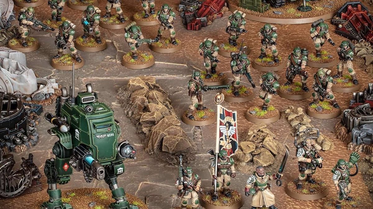 An image of painted models in the Astra Militarum Army for Warhammer 40k, depicting soldiers with lasguns in green and beige