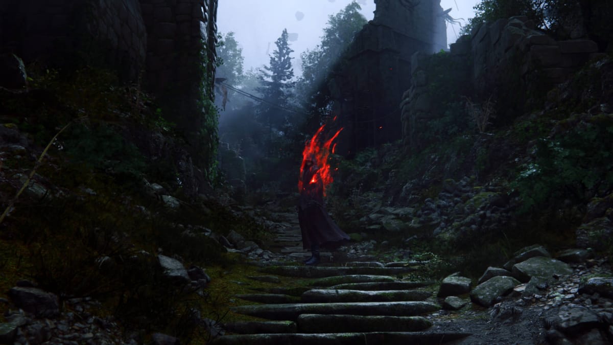 A figure mysteriously smoldering amid ruins in Final Fantasy 16