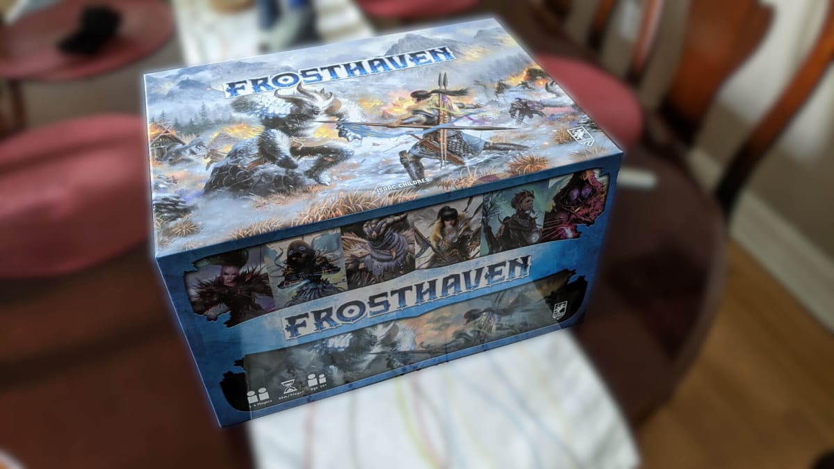 The box for Frosthaven sitting against a blurry background