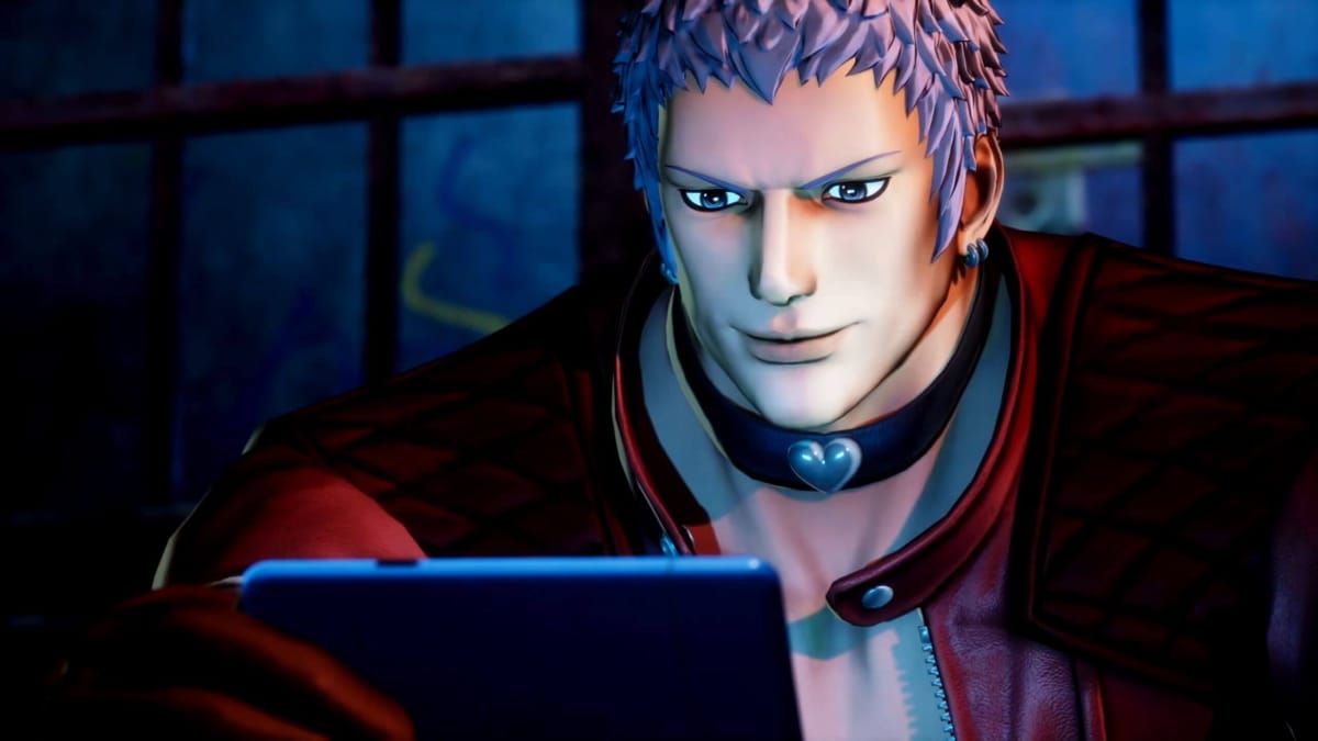 Yashiro smiling as he looks at his phone in King of Fighters XV