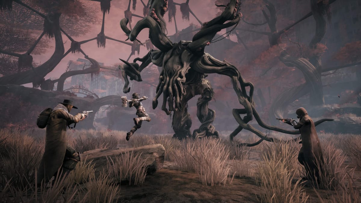 Three warriors facing off against a Root monster in Remnant: From the Ashes