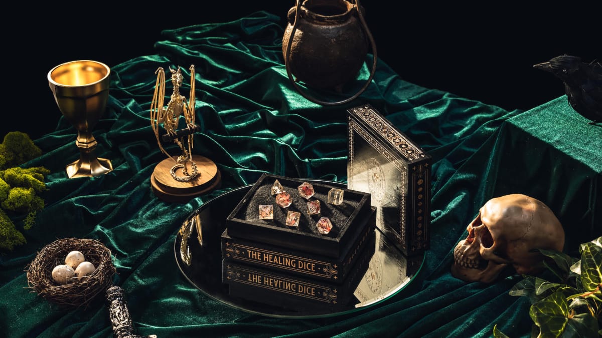 An image of The Healing Dice amidst a skull and goblet