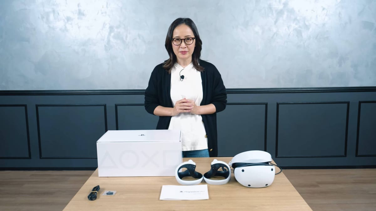 PlayStation's Kei Yoneyama with a PSVR 2 box in front of her